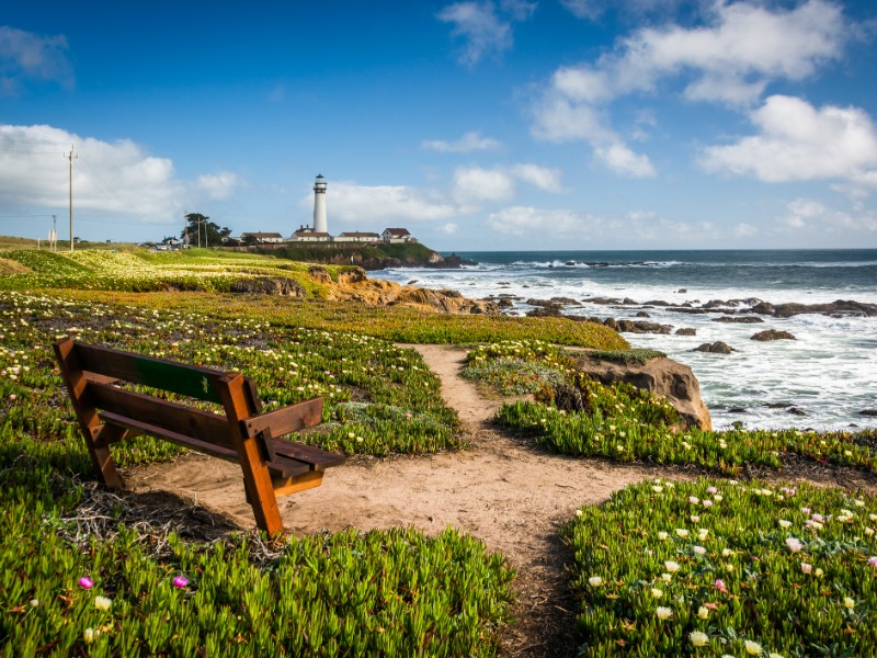 Bench and view of Piegon Point Lighthouse in Pescadero, California.