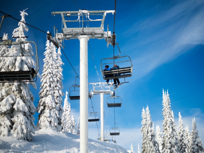 Skiers on the Attridge Chair at SilverStar Mountain