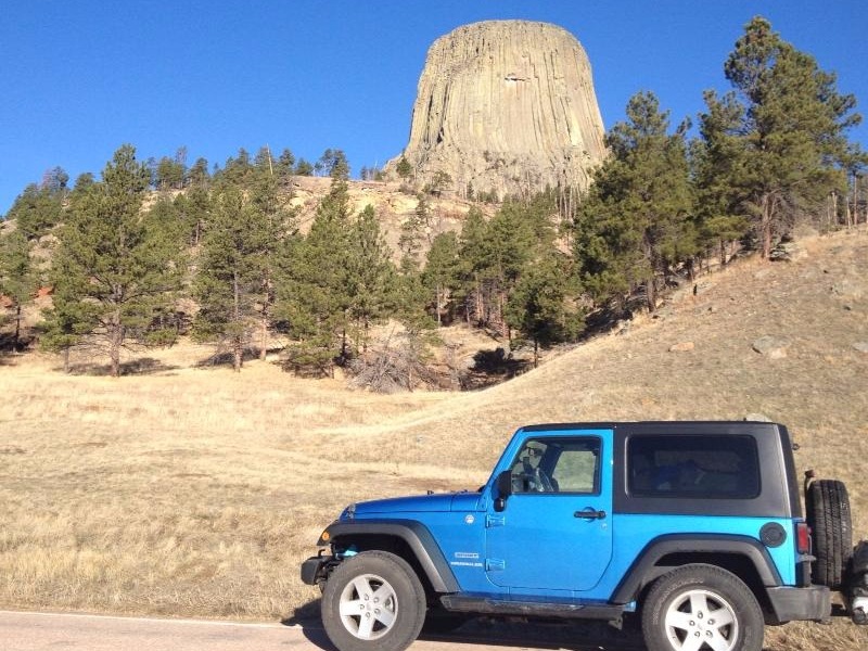 Devil's Tower view with jeep