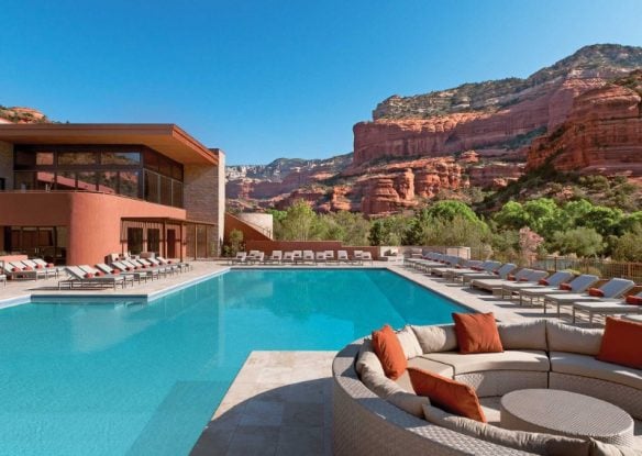 pool with red rock formations at Enchantment Resort