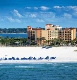 blue umbrellas along coastline at sheraton