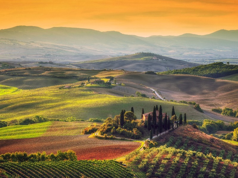 sunrise over a stunning Tuscan landscape