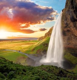 view of a waterfall at sunrise