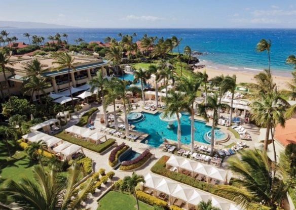 aerial view of beachfront resort pool in hawaii