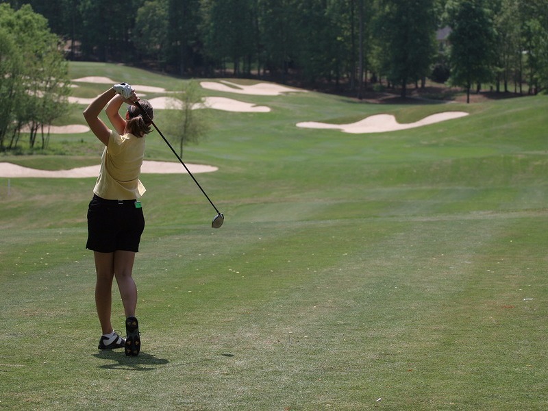 Practicing a golf swing in Stockbridge 