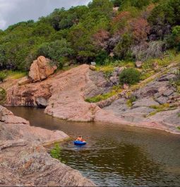 stream with red rocks on both sides