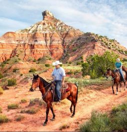 men on horseback in canyonlands