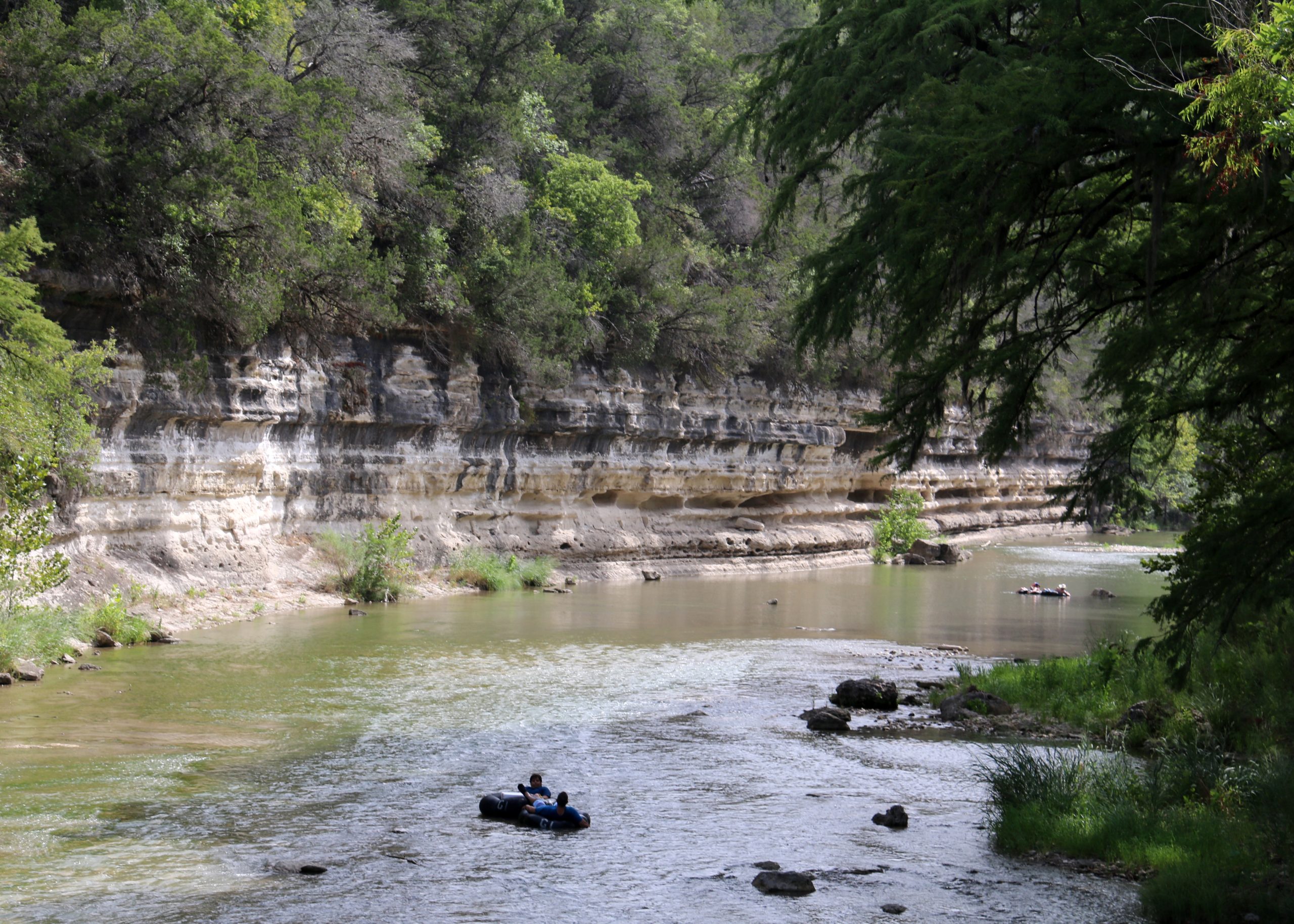 Rafting on inner tubes on the Guadeloupe River, Texas