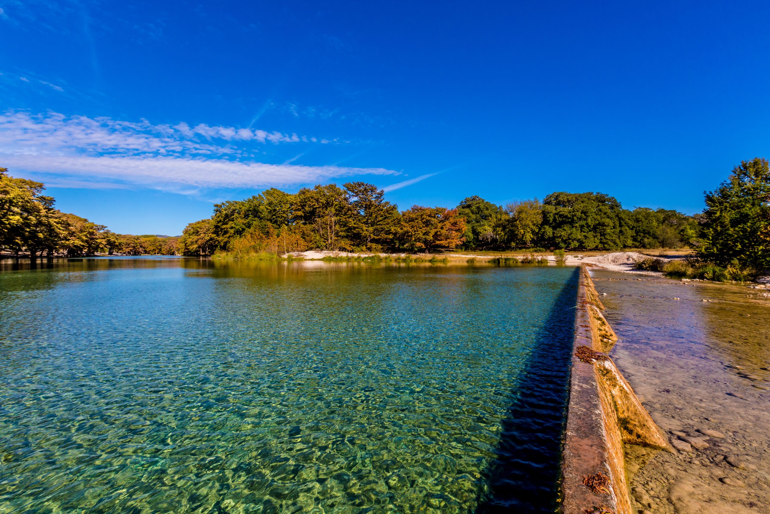  Fall Foliage on the Crystal Clear Frio River at the Swimming Area at Garner State Park, Texas