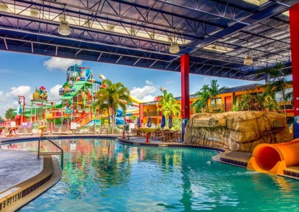 indoor and outdoor water park with jungle gym and slides