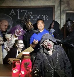 scare actors at haunted house in front of 17th floor sign