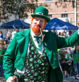 leprechaun dressed in green during parade