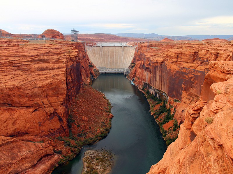 View of red rocks and Glen Canyon Dam