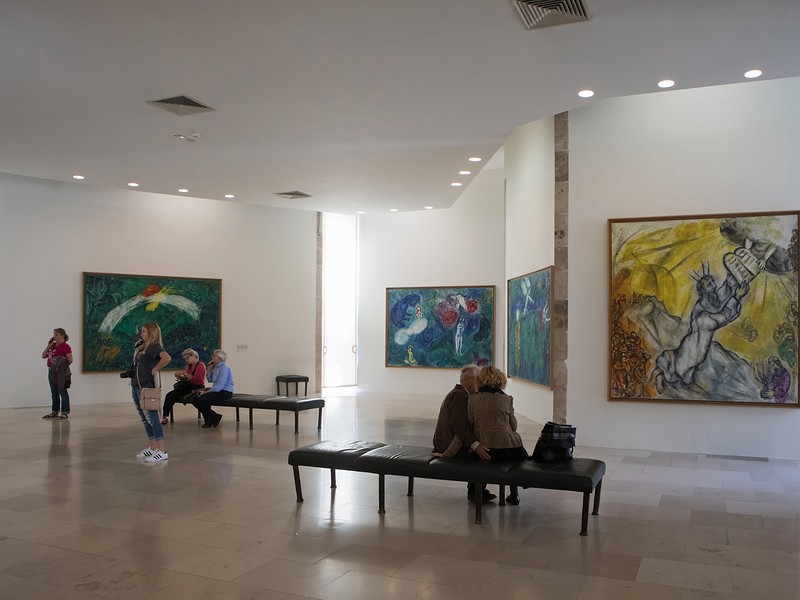 Tourists look at the paintings by Marc Chagall in The Biblical Message room, Marc Chagall Museum, Nice, France