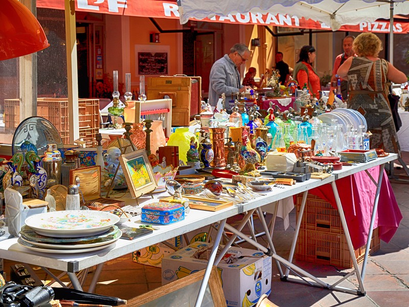 Market stall at the famous antique market Cours Saleya every Monday in Nice