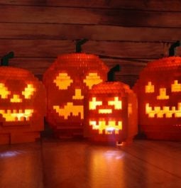 four jack o lanterns lined up