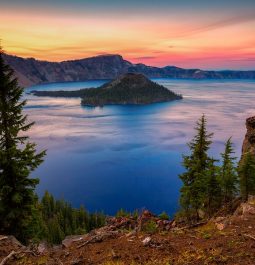 panoramic shot of crater lake as sun is setting