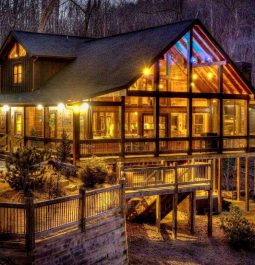 back porch view of cabin lit up in blue ridge georgia