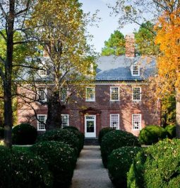 exterior view of berkeley plantation with golden trees