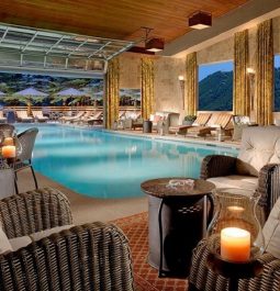 indoor pool surrounded by lounge chairs