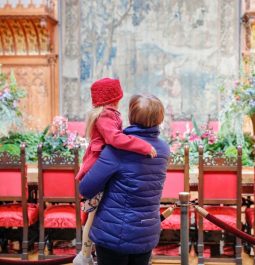 adult and child embracing at biltmore christmas event