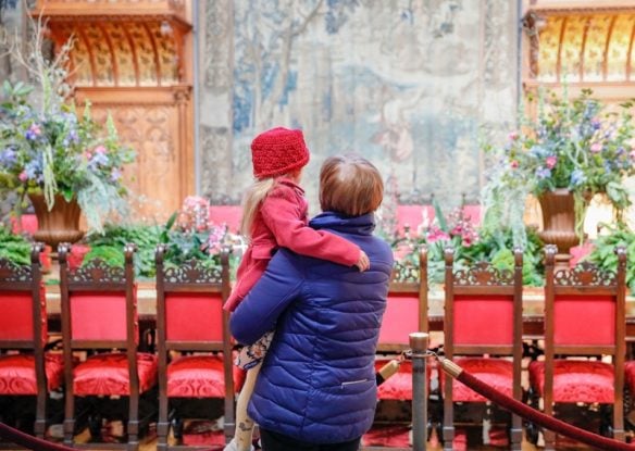 adult and child embracing at biltmore christmas event
