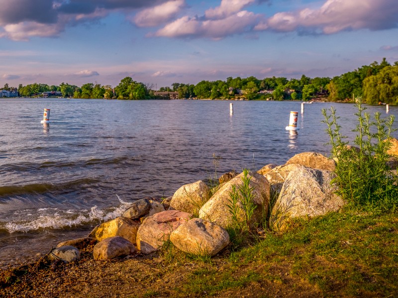 Early evening in the summer on the shore at Goguac Lake in Battle Creek, Michigan