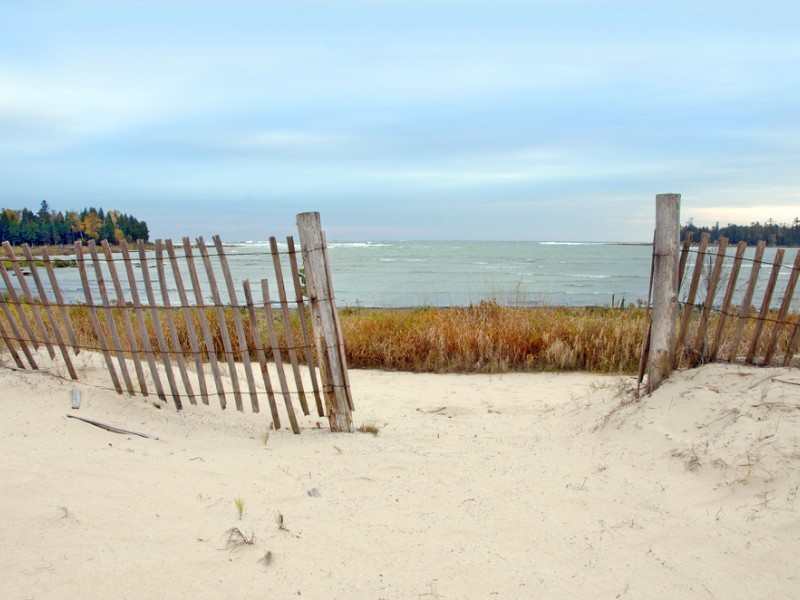 Fence on a beach in Door County, Wisconsin