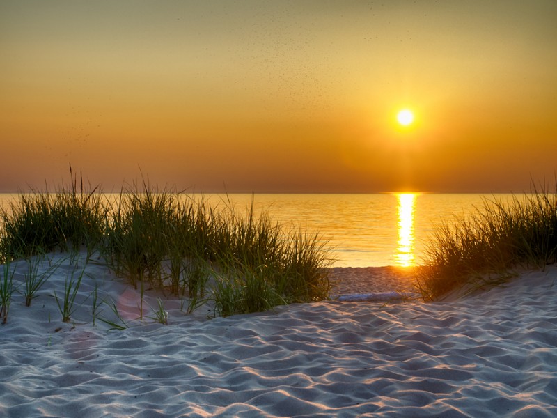 The sunset over Lake Michigan as seen from the Esch Road Beach, part of the Sleeping Bear Dunes National Lakeshore