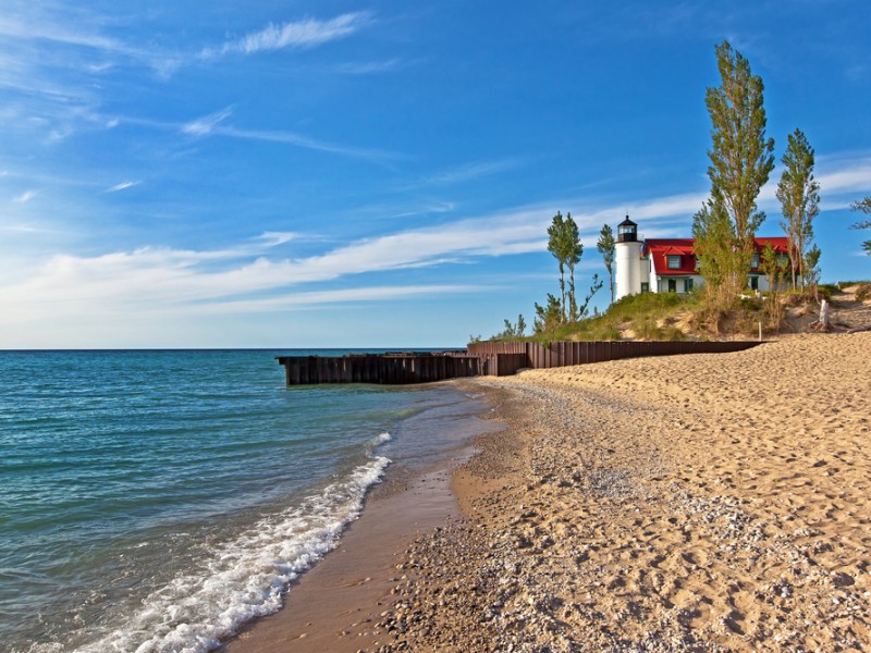 Point Betsie Lighthouse on the shores of Lake Michigan on a summer day