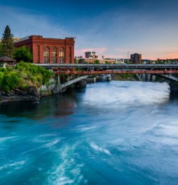 river flowing under bridge in spokane