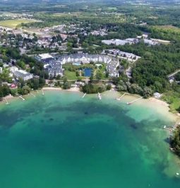 aerial view of lake and resort on beach