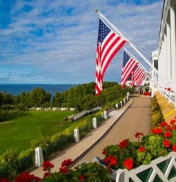 flag hanging outside grand hotel porch