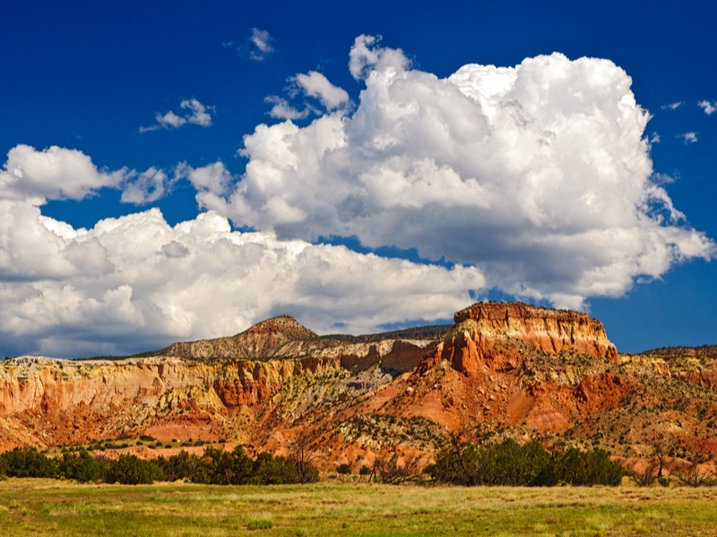 Abiquiu New Mexico landscape with cliffs and clouds