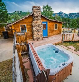 This historic cabin comes with a private hot tub and scenic mountain views