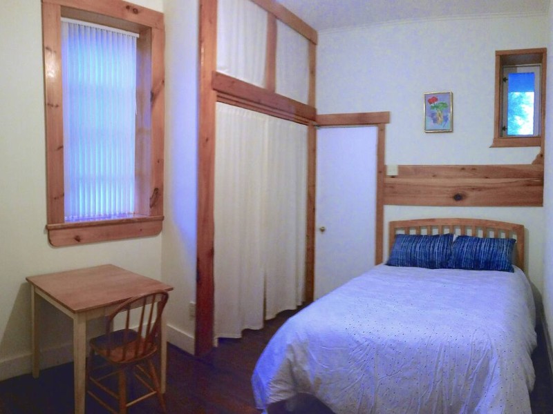 Bedroom at Modest Accommodations at Urban Homestead