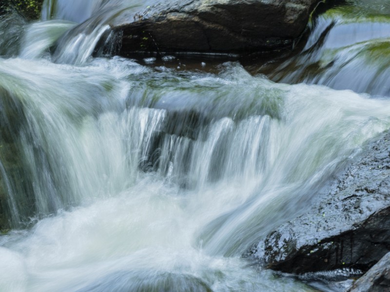 Water cascading along rocky bottom of Blackstone Gorge