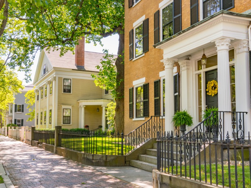 Historic New England houses along street in Salem