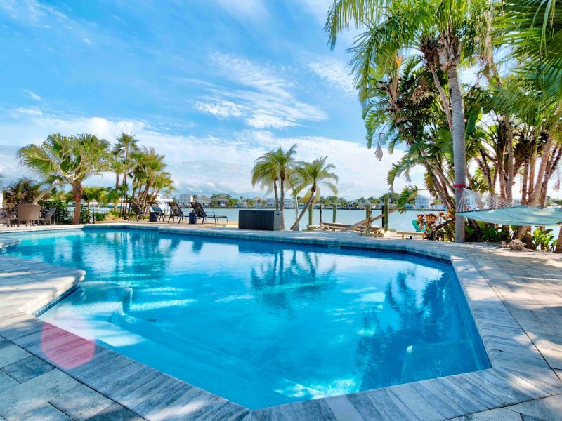 Spot Dolphins From the Pool at This Waterfront Home