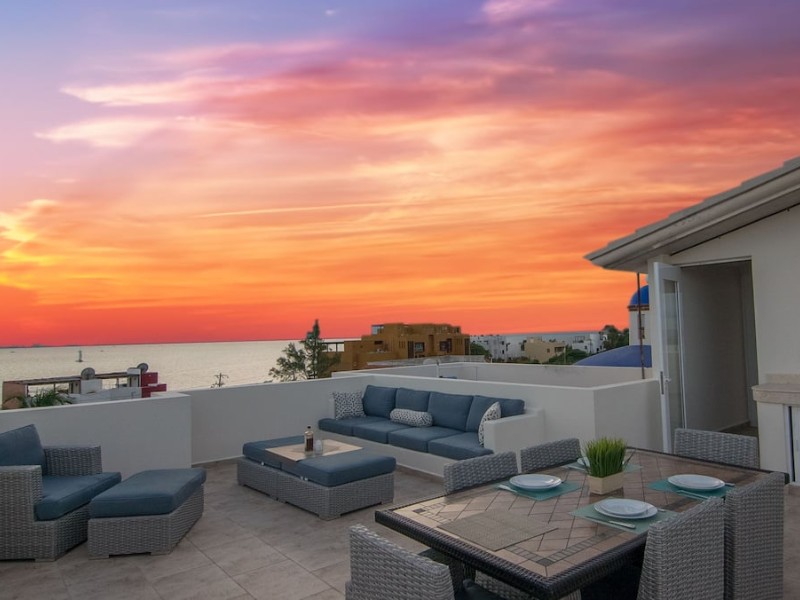 Rooftop deck at sunset on 'Experience Luxury on Isla Mujeres'