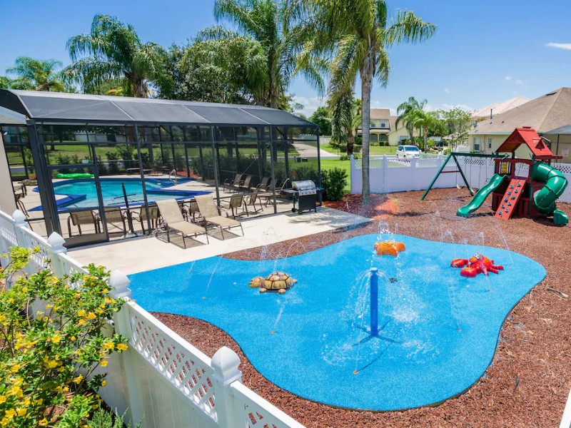 7-Bed Home with Themed Rooms, Movie Theater, Swing Set, and SplashPad