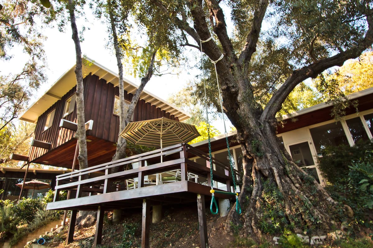 Outside the Private Treehouse in a Mid-Century Home