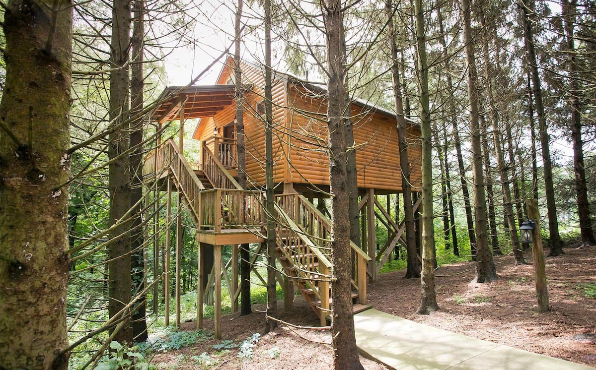 Side of Romantic Treehouse with Treetop Views