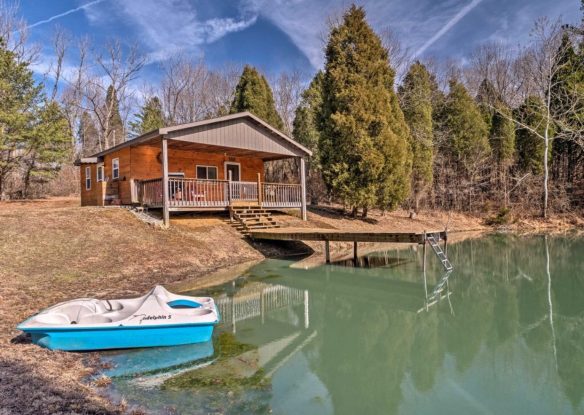 Blue hued pond with paddle boat