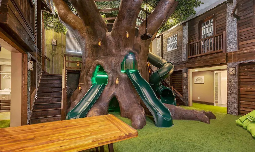 The kids' can play in this home's treehouse-inspired indoor play area.