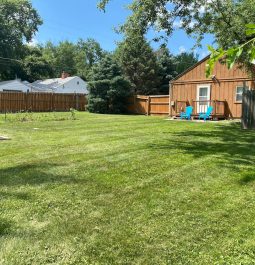 Yard view of home with outside seating