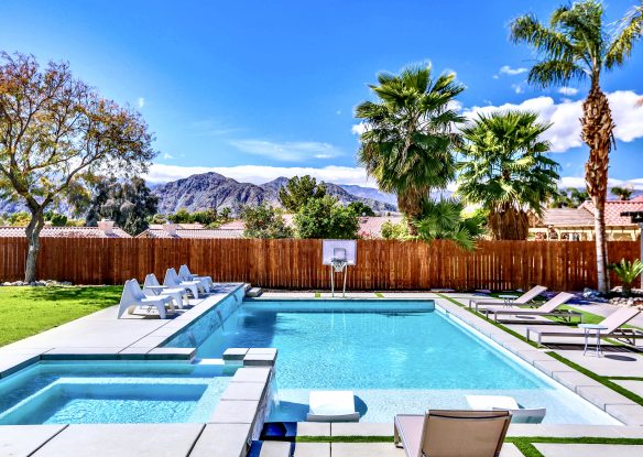 large pool area with mountain views