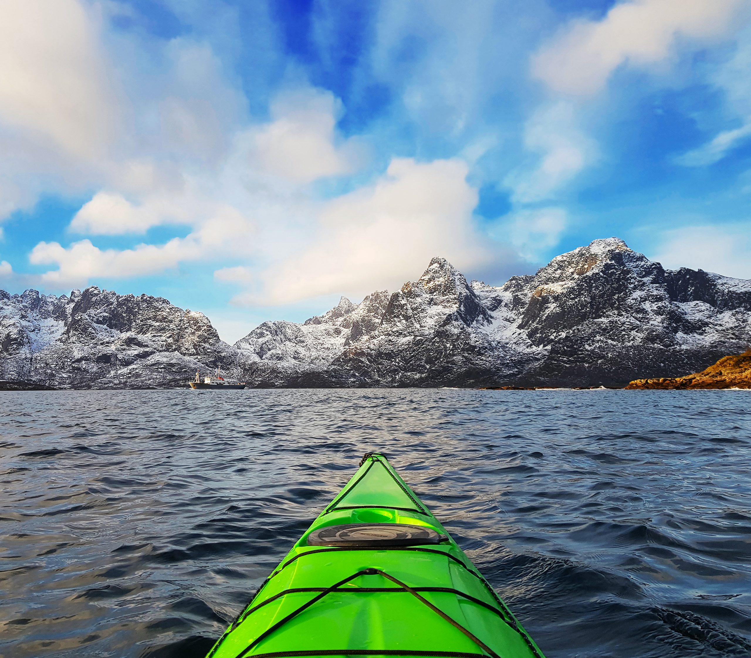 Kayaking in a bay fjord, Lofoten Islands