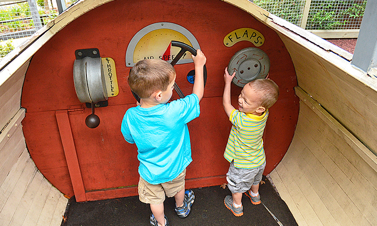 Dollywood's Lil' Pilots Playground lets kids (safely) climb inside the cockpit of a wooden biplane.