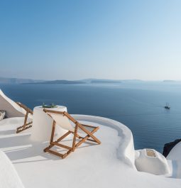 Terrace of cave with deckchair looking out at sea